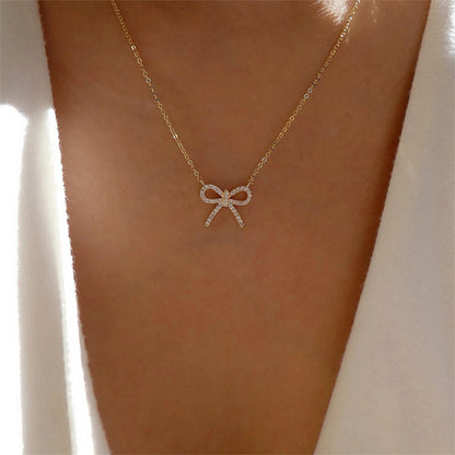 Aurora goudkleurige ketting met strik